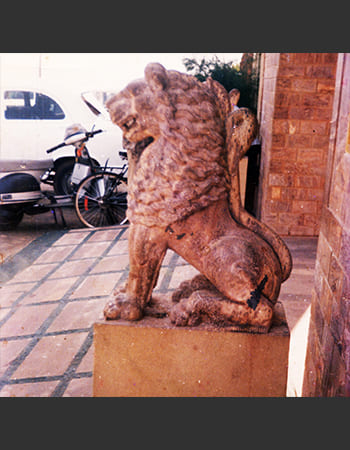 Elegant stone sculpture installation at luxury hotel entrance showcasing traditional craftsmanship