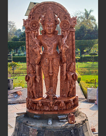 Corporate lobby stone carving featuring intricate architectural details and cultural motifs