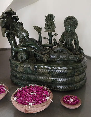 Luxury hotel stone fountain installation with decorative carved elements