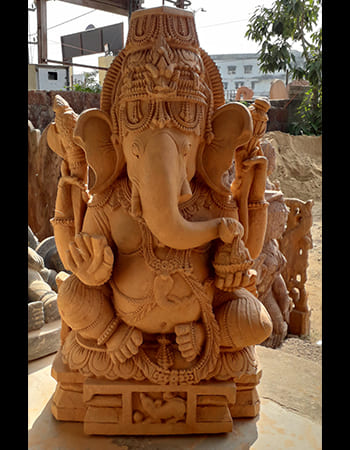 Artistic Ganesh sculpture with traditional tilaka markings and detailed elephant head carving