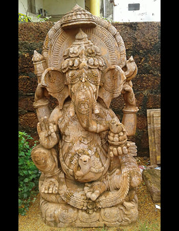 Elegant Ganesha idol with lotus base and traditional Indian temple art styling