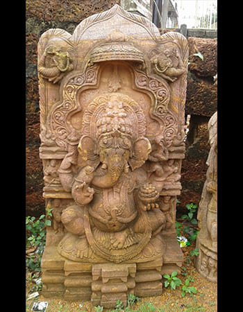 Divine Ganesh statue with ornate crown and detailed costume for spiritual protection